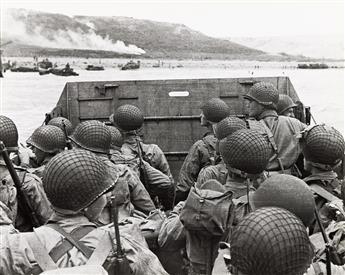 (WWII) A selection of 5 photographs documenting the Allied D-Day landing and its aftermath.